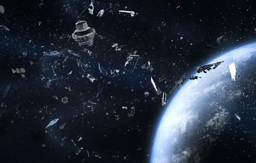 Artist's rendering of a cloud of metal scrap floating in orbit above earth, seen from space